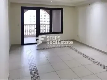 2 Bedrooms  Apartment  For Rent  in Doha -  The Pearl  Semi Furnished