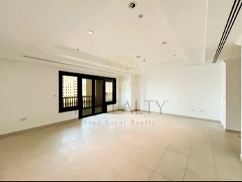 4 Bedrooms  Apartment  For Rent  in Doha -  The Pearl  Not Furnished