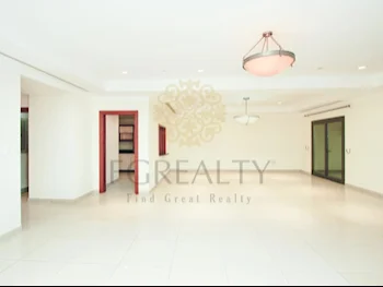 2 Bedrooms  Apartment  For Rent  in Doha -  The Pearl  Not Furnished