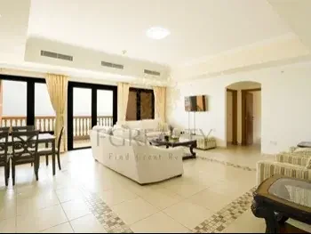 2 Bedrooms  Apartment  For Rent  in Doha -  The Pearl  Fully Furnished