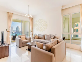 2 Bedrooms  Apartment  For Rent  in Doha -  The Pearl  Fully Furnished