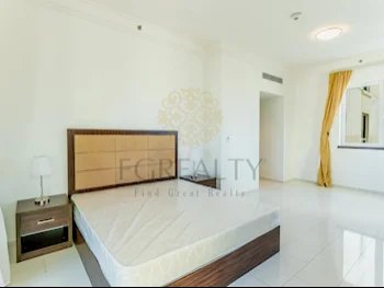 2 Bedrooms  Apartment  For Rent  in Doha -  The Pearl  Fully Furnished