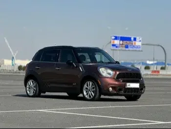 Mini  Cooper  CountryMan  2013  Automatic  107,000 Km  4 Cylinder  Rear Wheel Drive (RWD)  Hatchback  Brown