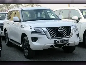 Nissan  Patrol  SE  2023  Automatic  0 Km  6 Cylinder  Four Wheel Drive (4WD)  SUV  White  With Warranty