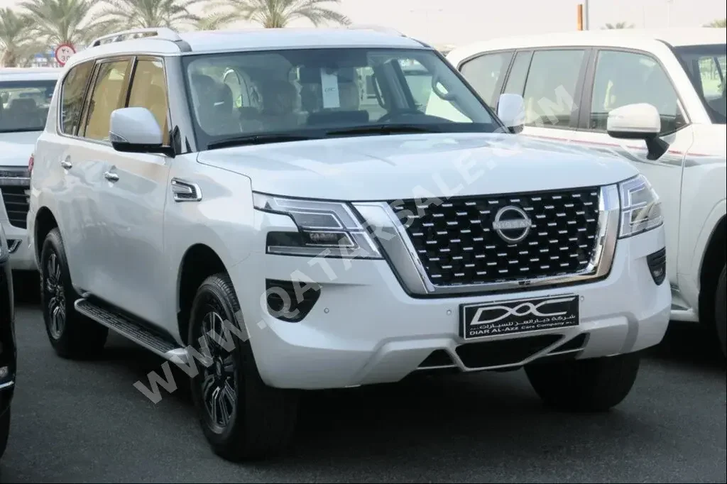 Nissan  Patrol  SE  2023  Automatic  0 Km  6 Cylinder  Four Wheel Drive (4WD)  SUV  White  With Warranty