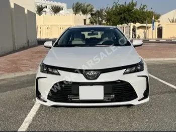 Toyota  Corolla  4 Cylinder  Sedan  White  2022