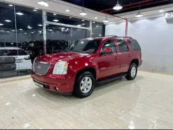 GMC  Yukon  SLE  2014  Automatic  84,000 Km  8 Cylinder  Rear Wheel Drive (RWD)  SUV  Red