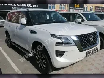 Nissan  Patrol  SE  2023  Automatic  0 Km  6 Cylinder  Four Wheel Drive (4WD)  SUV  White  With Warranty