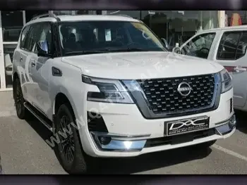 Nissan  Patrol  Platinum  2023  Automatic  0 Km  6 Cylinder  Four Wheel Drive (4WD)  SUV  White  With Warranty