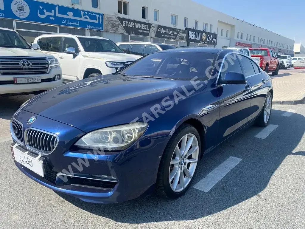  بي ام دبليو  الفئة - السادسة  640i  2013  اوتوماتيك  163,000 كم  6 سلندر  دفع خلفي  سيدان  ازرق  تحت الضمان