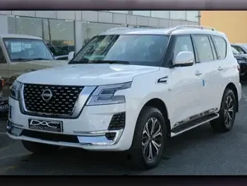 Nissan  Patrol  Titanium  2023  Automatic  0 Km  8 Cylinder  Four Wheel Drive (4WD)  SUV  White  With Warranty