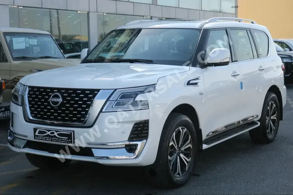 Nissan  Patrol  Titanium  2023  Automatic  0 Km  8 Cylinder  Four Wheel Drive (4WD)  SUV  White  With Warranty