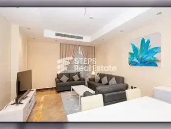 2 Bedrooms  Apartment  For Rent  in Doha -  The Pearl  Fully Furnished