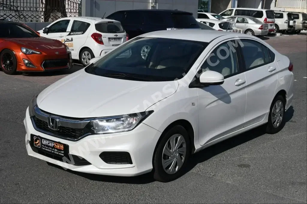 Honda  City  2020  Automatic  107,000 Km  4 Cylinder  Front Wheel Drive (FWD)  Sedan  White  With Warranty