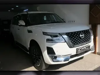 Nissan  Patrol  Platinum  2023  Automatic  0 Km  6 Cylinder  Four Wheel Drive (4WD)  SUV  White  With Warranty