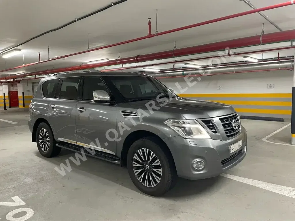 Nissan  Patrol  Platinum  2014  Automatic  207,000 Km  8 Cylinder  Four Wheel Drive (4WD)  SUV  Gray