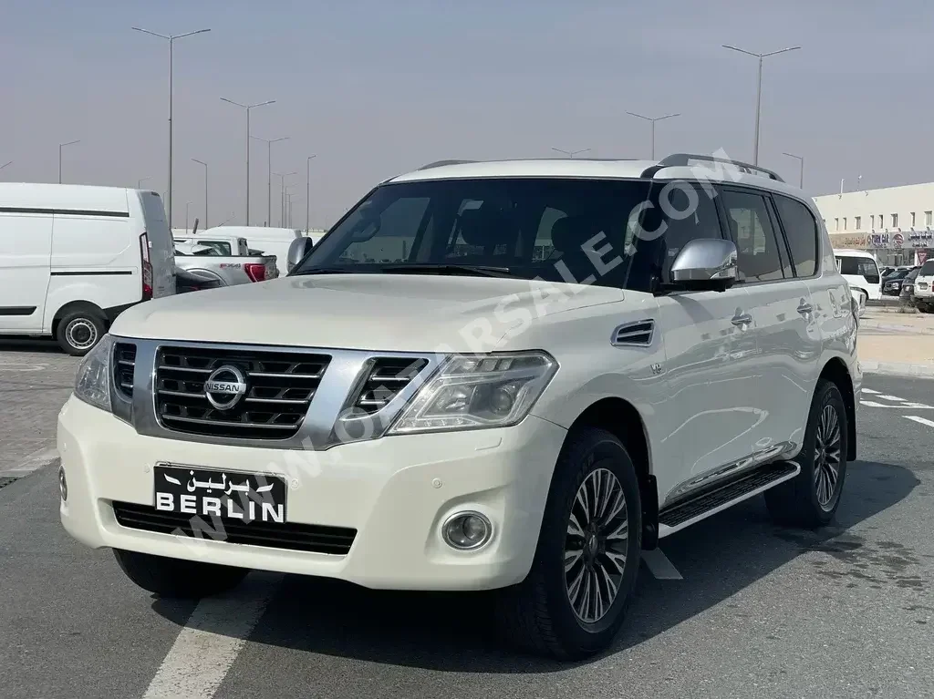 Nissan  Patrol  Platinum  2014  Automatic  161,000 Km  8 Cylinder  Four Wheel Drive (4WD)  SUV  White