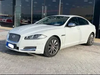 Jaguar  XF  2014  Automatic  128,000 Km  4 Cylinder  Rear Wheel Drive (RWD)  Sedan  White