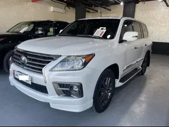  Lexus  LX  570  2014  Automatic  239,000 Km  8 Cylinder  Four Wheel Drive (4WD)  SUV  White  With Warranty