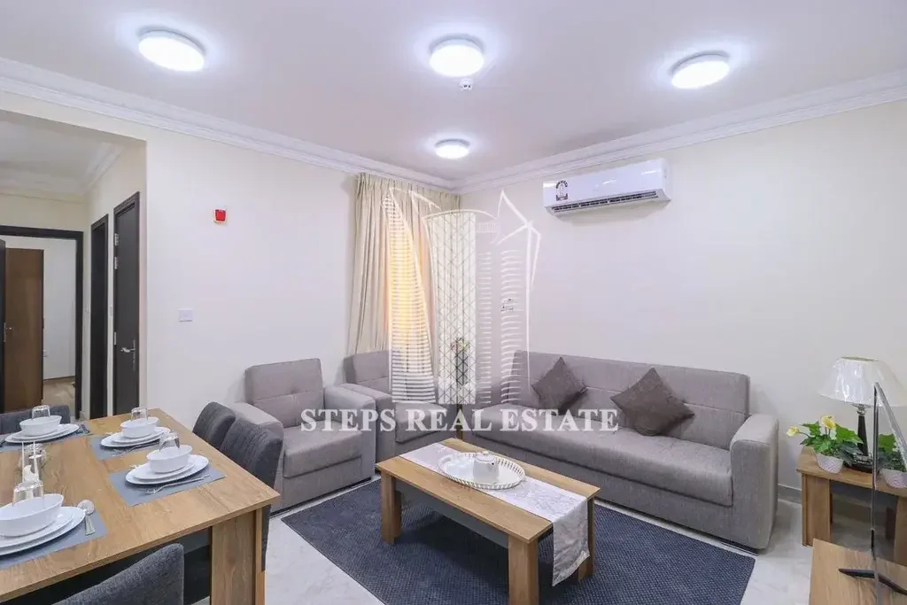 2 Bedrooms  Apartment  For Rent  in Doha -  Al Duhail  Fully Furnished