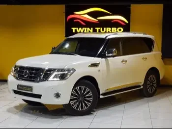 Nissan  Patrol  Platinum  2014  Automatic  204,000 Km  8 Cylinder  Four Wheel Drive (4WD)  SUV  White