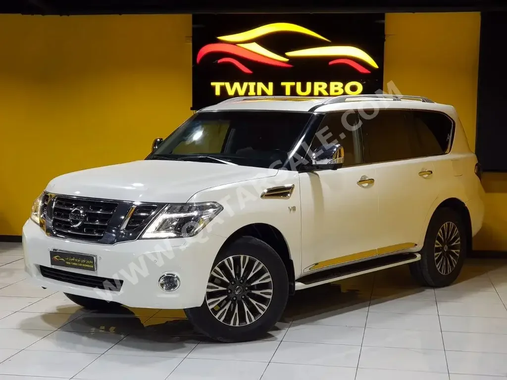 Nissan  Patrol  Platinum  2014  Automatic  204,000 Km  8 Cylinder  Four Wheel Drive (4WD)  SUV  White