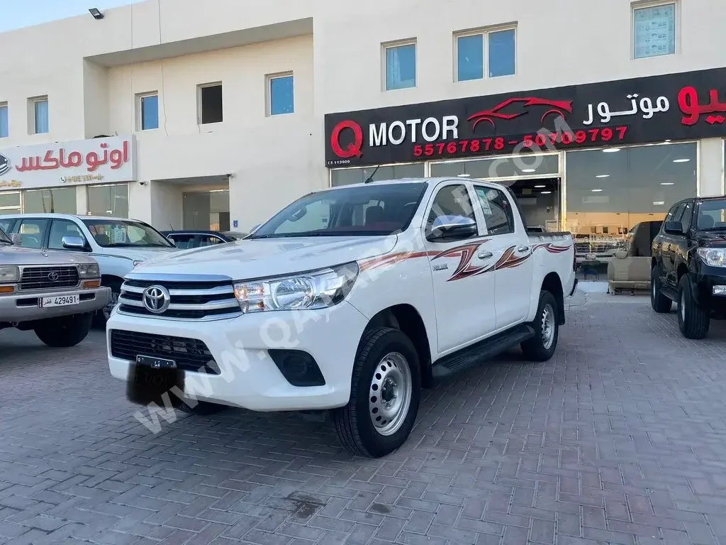  Toyota  Hilux  2023  Manual  99,000 Km  4 Cylinder  Four Wheel Drive (4WD)  Pick Up  White  With Warranty