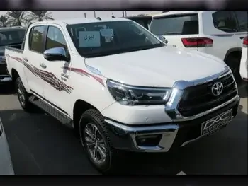 Toyota  Hilux  2024  Automatic  0 Km  4 Cylinder  Four Wheel Drive (4WD)  Pick Up  White  With Warranty