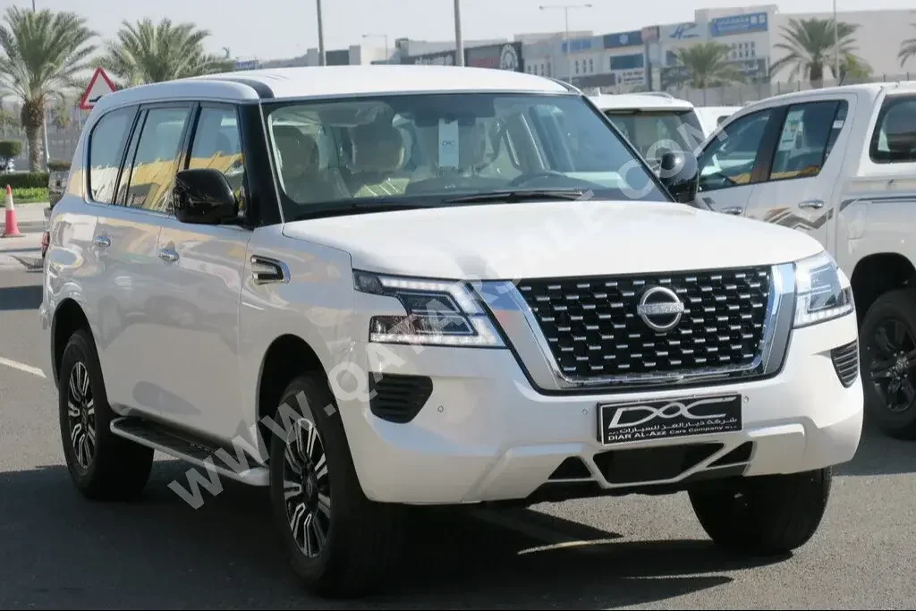 Nissan  Patrol  XE  2023  Automatic  0 Km  6 Cylinder  Four Wheel Drive (4WD)  SUV  White  With Warranty