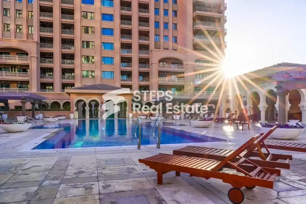 4 Bedrooms  Apartment  For Rent  in Doha -  The Pearl  Semi Furnished