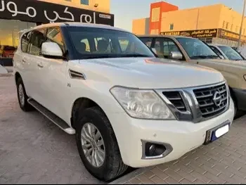 Nissan  Patrol  SE  2014  Automatic  206,534 Km  8 Cylinder  Four Wheel Drive (4WD)  SUV  White