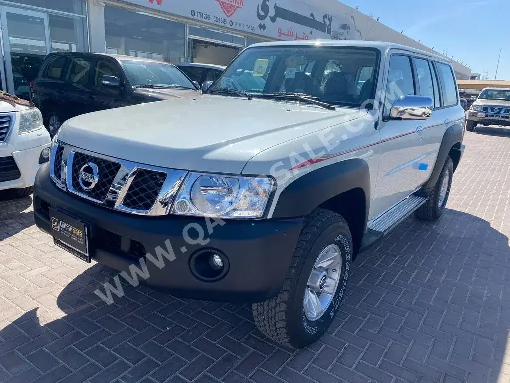 Nissan  Patrol  Safari  2023  Automatic  0 Km  6 Cylinder  Four Wheel Drive (4WD)  SUV  White  With Warranty