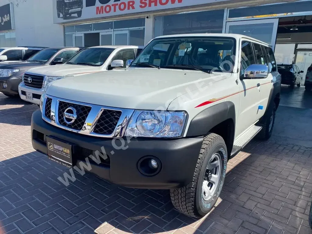 Nissan  Patrol  Safari  2023  Automatic  0 Km  6 Cylinder  Four Wheel Drive (4WD)  SUV  White  With Warranty