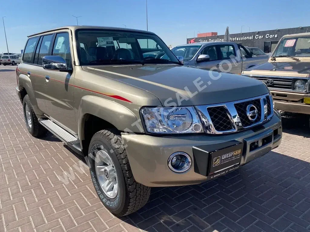 Nissan  Patrol  Safari  2023  Automatic  0 Km  6 Cylinder  Four Wheel Drive (4WD)  SUV  Gold  With Warranty