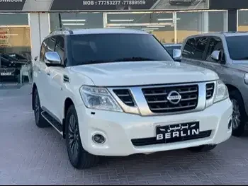 Nissan  Patrol  Platinum  2014  Automatic  127,000 Km  8 Cylinder  Four Wheel Drive (4WD)  SUV  White