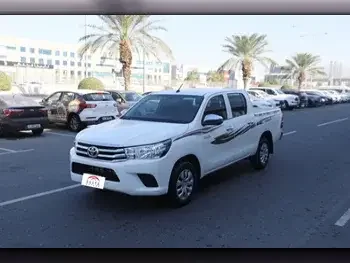 Toyota  Hilux  2018  Manual  63,000 Km  4 Cylinder  Rear Wheel Drive (RWD)  Pick Up  White