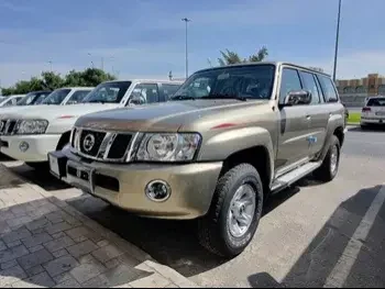 Nissan  Patrol  Safari  2023  Automatic  0 Km  6 Cylinder  Four Wheel Drive (4WD)  SUV  Gold  With Warranty