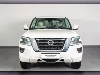 Nissan  Patrol  LE Titanium  2020  Automatic  18,240 Km  8 Cylinder  Four Wheel Drive (4WD)  SUV  White