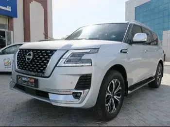 Nissan  Patrol  Titanium  2023  Automatic  17,000 Km  8 Cylinder  Four Wheel Drive (4WD)  SUV  Silver  With Warranty