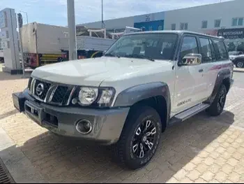 Nissan  Patrol  Super Safari  2023  Automatic  1,400 Km  6 Cylinder  Four Wheel Drive (4WD)  SUV  White  With Warranty