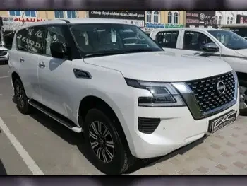 Nissan  Patrol  XE  2023  Automatic  0 Km  6 Cylinder  Four Wheel Drive (4WD)  SUV  White  With Warranty