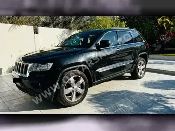 Jeep  Grand Cherokee  SRT-8  2013  Automatic  117,500 Km  8 Cylinder  Four Wheel Drive (4WD)  SUV  Black