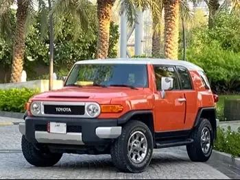 Toyota  FJ Cruiser  2013  Automatic  127,000 Km  6 Cylinder  Four Wheel Drive (4WD)  SUV  Orange