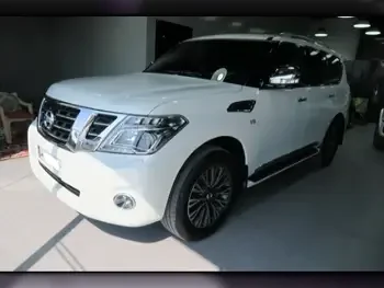 Nissan  Patrol  Platinum  2015  Automatic  117,000 Km  8 Cylinder  Four Wheel Drive (4WD)  SUV  White