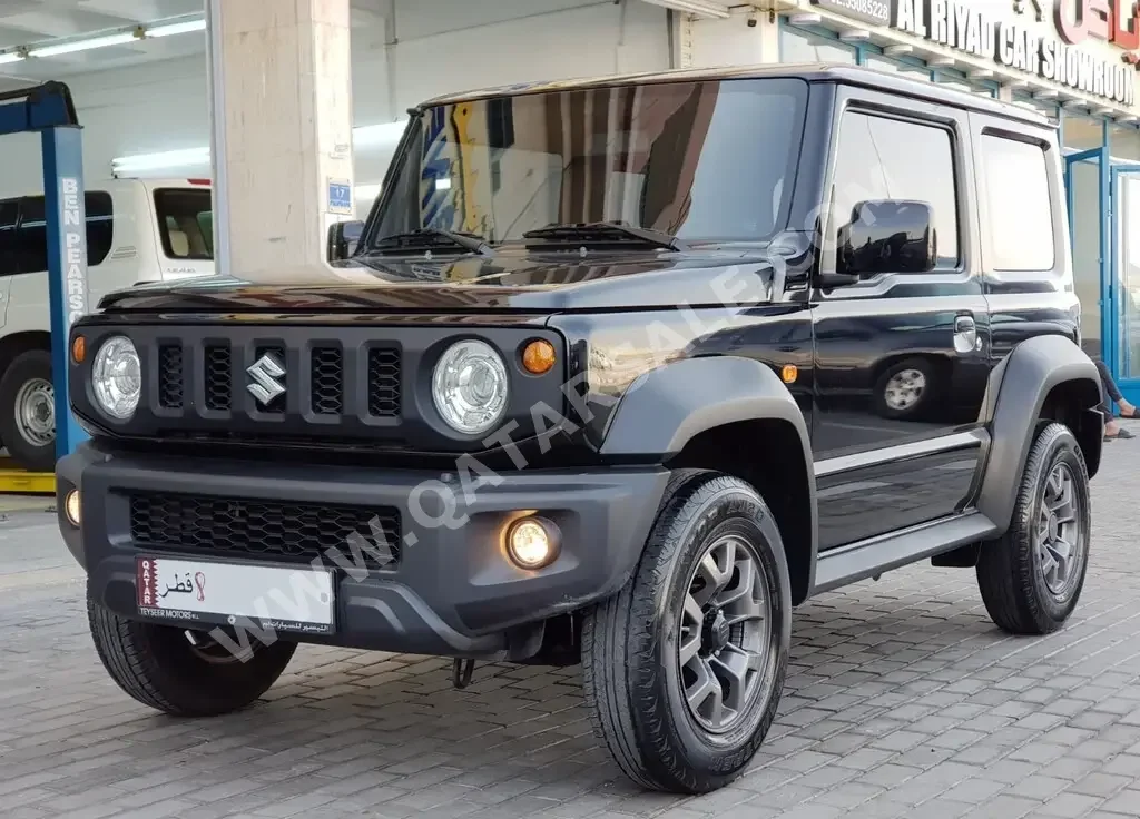 Suzuki  Jimny  2023  Automatic  84,000 Km  4 Cylinder  Four Wheel Drive (4WD)  SUV  Black  With Warranty