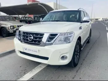 Nissan  Patrol  Platinum  2014  Automatic  342,000 Km  8 Cylinder  Four Wheel Drive (4WD)  SUV  White