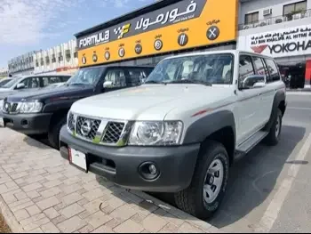 Nissan  Patrol  GL  2023  Automatic  0 Km  6 Cylinder  Four Wheel Drive (4WD)  SUV  White  With Warranty