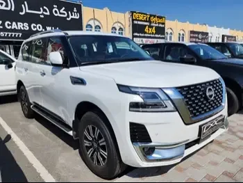 Nissan  Patrol  Titanium  2023  Automatic  0 Km  6 Cylinder  Four Wheel Drive (4WD)  SUV  White  With Warranty