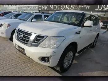 Nissan  Patrol  SE  2014  Automatic  206,000 Km  8 Cylinder  Four Wheel Drive (4WD)  SUV  White