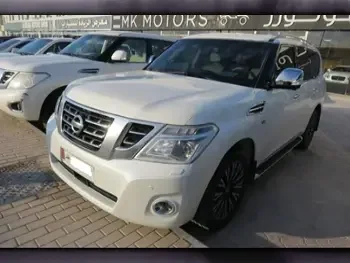 Nissan  Patrol  Platinum  2015  Automatic  168,000 Km  8 Cylinder  Four Wheel Drive (4WD)  SUV  White